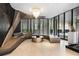 Modern lobby area with unique seating, tile floors, accent lighting, and wall to wall window views at 145 15Th Ne St # 435, Atlanta, GA 30309