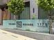 View of building signage with the address '1175 Peachtree St.' at 145 15Th Ne St # 435, Atlanta, GA 30309