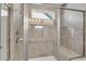 Walk-in bathroom shower with glass enclosure, rain shower head, and convenient grab bar at 244 Walnut Ridge Rd, Canton, GA 30115