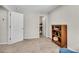 Bedroom with a bookshelf and open closet area at 244 Walnut Ridge Rd, Canton, GA 30115