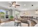 Spacious living room offers hardwood floors, a ceiling fan, and a cozy seating area at 244 Walnut Ridge Rd, Canton, GA 30115