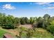 Scenic view of pond surrounded by lush trees, offering a tranquil backdrop at 244 Walnut Ridge Rd, Canton, GA 30115