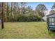 A sprawling backyard offers serene views and lush greenery at 285 Independence Dr, Jonesboro, GA 30238