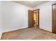 Bedroom featuring one window, carpeted floor, and bathroom access at 285 Independence Dr, Jonesboro, GA 30238