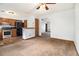 Eat-in kitchen featuring stainless steel appliances, wood cabinets, and a breakfast bar for casual dining at 285 Independence Dr, Jonesboro, GA 30238