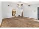 Spacious living room offers seamless flow to the kitchen, features neutral carpeting, and a welcoming ambiance at 285 Independence Dr, Jonesboro, GA 30238