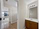 Bathroom vanity with sink and view to a connecting room at 400 Icicle Ct, Hampton, GA 30228