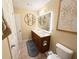 Bathroom featuring double vanity, updated hardware, and modern lighting at 985 Forest Knoll Court Ct, Lithia Springs, GA 30122