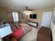 Bedroom features warm lighting, stylish furnishings, and comfortable bedding at 985 Forest Knoll Court, Lithia Springs, GA 30122