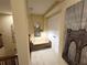 Hallway sitting area features neutral carpet, bench, lighting and art at 985 Forest Knoll Court Ct, Lithia Springs, GA 30122