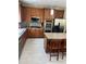 Updated kitchen featuring stainless steel appliances and ample counter space and cabinets at 985 Forest Knoll Court, Lithia Springs, GA 30122