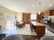 Open kitchen with a center island, stainless appliances, and adjacent breakfast area at 985 Forest Knoll Court Ct, Lithia Springs, GA 30122