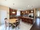Well-equipped kitchen with stainless steel appliances and an island with bar seating at 985 Forest Knoll Court Ct, Lithia Springs, GA 30122