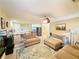 Bright living room upstairs with neutral decor, ceiling fan, and comfortable seating at 985 Forest Knoll Court Ct, Lithia Springs, GA 30122