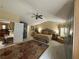 Large main bedroom suite with ceiling fan, sitting area, and custom closet at 985 Forest Knoll Court, Lithia Springs, GA 30122