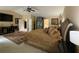Main bedroom boasts a ceiling fan and en-suite bathroom at 985 Forest Knoll Court, Lithia Springs, GA 30122