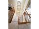 Elegant staircase featuring wooden railings and new carpet leading to upper floor at 985 Forest Knoll Court Ct, Lithia Springs, GA 30122