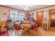 Dining area with wood floors, wallpapered walls, and a round wood table with chairs at 2985 Duke Of Gloucester, Atlanta, GA 30344