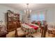 Formal dining room with chandelier lighting and classic furnishings at 2985 Duke Of Gloucester, Atlanta, GA 30344
