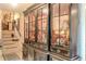 Elegant entryway with a decorative display cabinet and classic decor at 2985 Duke Of Gloucester, Atlanta, GA 30344