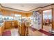 View of the kitchen featuring wood cabinets, center island, and a white refrigerator at 2985 Duke Of Gloucester, Atlanta, GA 30344
