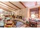 View of the expansive living room with a brick fireplace at 2985 Duke Of Gloucester, Atlanta, GA 30344