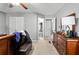 Spacious bedroom featuring two closets and wooden furniture, illuminated by natural light at 320 Little Creek Rd, Lawrenceville, GA 30045