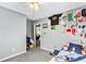 Bedroom features ceiling fan, decor on the wall, carpet, and neutral color scheme at 320 Little Creek Rd, Lawrenceville, GA 30045