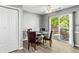 Dining area with patio access and seating for four at 320 Little Creek Rd, Lawrenceville, GA 30045