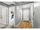 Bright entryway featuring hardwood floors, gray walls, and access to other rooms at 320 Little Creek Rd, Lawrenceville, GA 30045