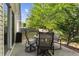 Patio with outdoor seating and view of the lush backyard at 320 Little Creek Rd, Lawrenceville, GA 30045