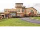Attractive exterior view of modern community building featuring brick and ample windows at 5920 Bond St # B206, Cumming, GA 30040