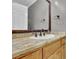 Bathroom featuring granite countertops and a black faucet on an oval sink at 701 Belgrave Ln, Tucker, GA 30084