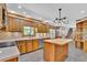 Spacious kitchen offering wood cabinets, countertops and modern appliances at 701 Belgrave Ln, Tucker, GA 30084