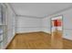 Open living room with hardwood floors and lots of natural light at 701 Belgrave Ln, Tucker, GA 30084