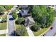 Beautiful aerial view of a private home nestled within a lush, green landscape in a suburban neighborhood at 1806 Royal Troon Ct, Duluth, GA 30097
