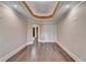 Bonus room with tile floors, recessed lighting, and a tray ceiling, providing a flexible space for various activities at 1806 Royal Troon Ct, Duluth, GA 30097