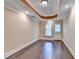 Bonus room with tile floors, recessed lighting, and a tray ceiling, providing a flexible space for various activities at 1806 Royal Troon Ct, Duluth, GA 30097