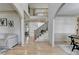 Spacious foyer showcasing hardwood floors, staircase, and architectural details throughout at 1806 Royal Troon Ct, Duluth, GA 30097