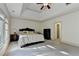 Bright and spacious main bedroom features large windows, a tray ceiling, and a luxurious, comfortable atmosphere at 1806 Royal Troon Ct, Duluth, GA 30097