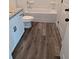 Clean bathroom features shower and tub combo, granite countertops, white cabinets, and modern fixtures at 586 Rodeo Dr, Auburn, GA 30102