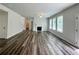 Spacious living room with lots of natural light, fireplace, and an open layout at 586 Rodeo Dr, Auburn, GA 30102