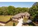 Well maintained home with mature trees, large lawn, and circular driveway at 1762 Patrick Rd, Dacula, GA 30019