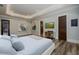A bedroom with light blue colored walls and modern interior decor at 1762 Patrick Rd, Dacula, GA 30019