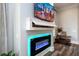 Close up of modern fireplace and mantle with a tv at 1762 Patrick Rd, Dacula, GA 30019
