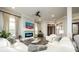 A spacious living room features a fireplace, hardwood floors, and contemporary decor at 1762 Patrick Rd, Dacula, GA 30019