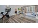 Spacious main bedroom with lots of natural light and workout equipment at 1762 Patrick Rd, Dacula, GA 30019