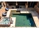 Backyard featuring a pool, hot tub, and lounge area with outdoor seating at 1762 Patrick Rd, Dacula, GA 30019