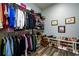 Walk-in closet with shelving and hanging storage for clothes and shoes at 1762 Patrick Rd, Dacula, GA 30019