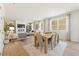 Inviting living space combining dining and living areas, filled with natural light and stylish furnishings at 8511 Polston Place- Lot 138, Douglasville, GA 30134